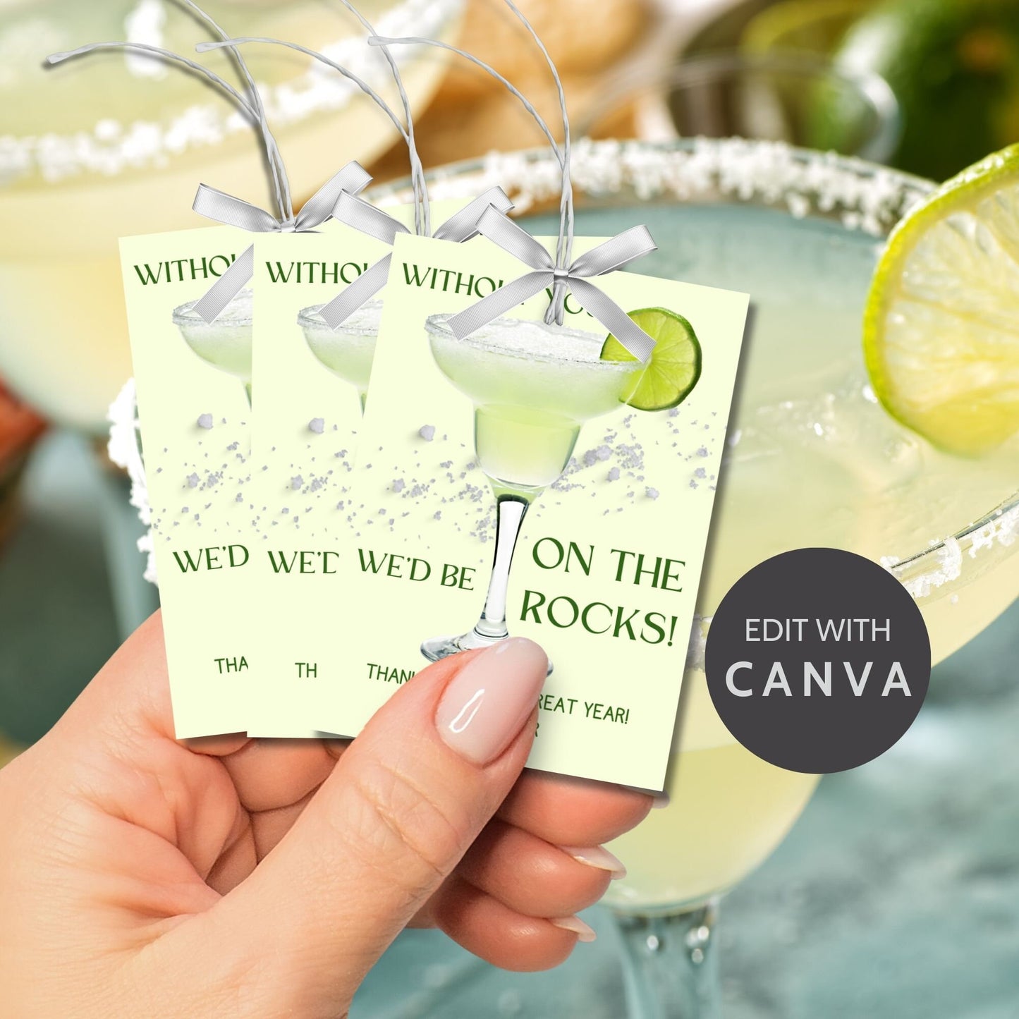 A sheet of light green gift tags with the text Without you, wed be on the rocks! in elegant green letters, featuring a margarita glass with a lime wedge and a customizable message that says Thank you for a great year! ❤️ Taylor.