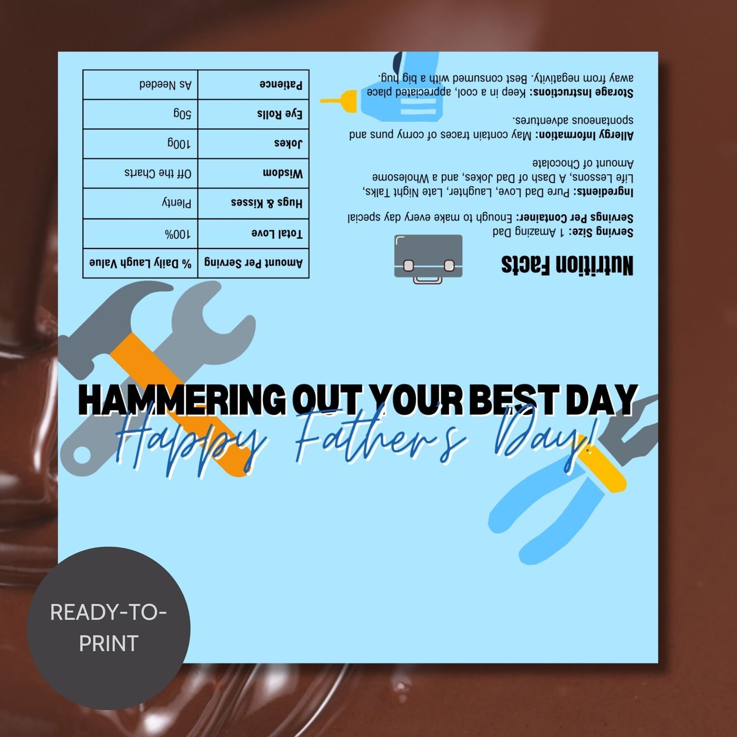 Blue and grey Fathers Day chocolate bar wrapper with toolbox graphics, featuring hammers and wrenches, and the text Hammering Out Your Best Day! Happy Fathers Day! from the Loving Family Co.