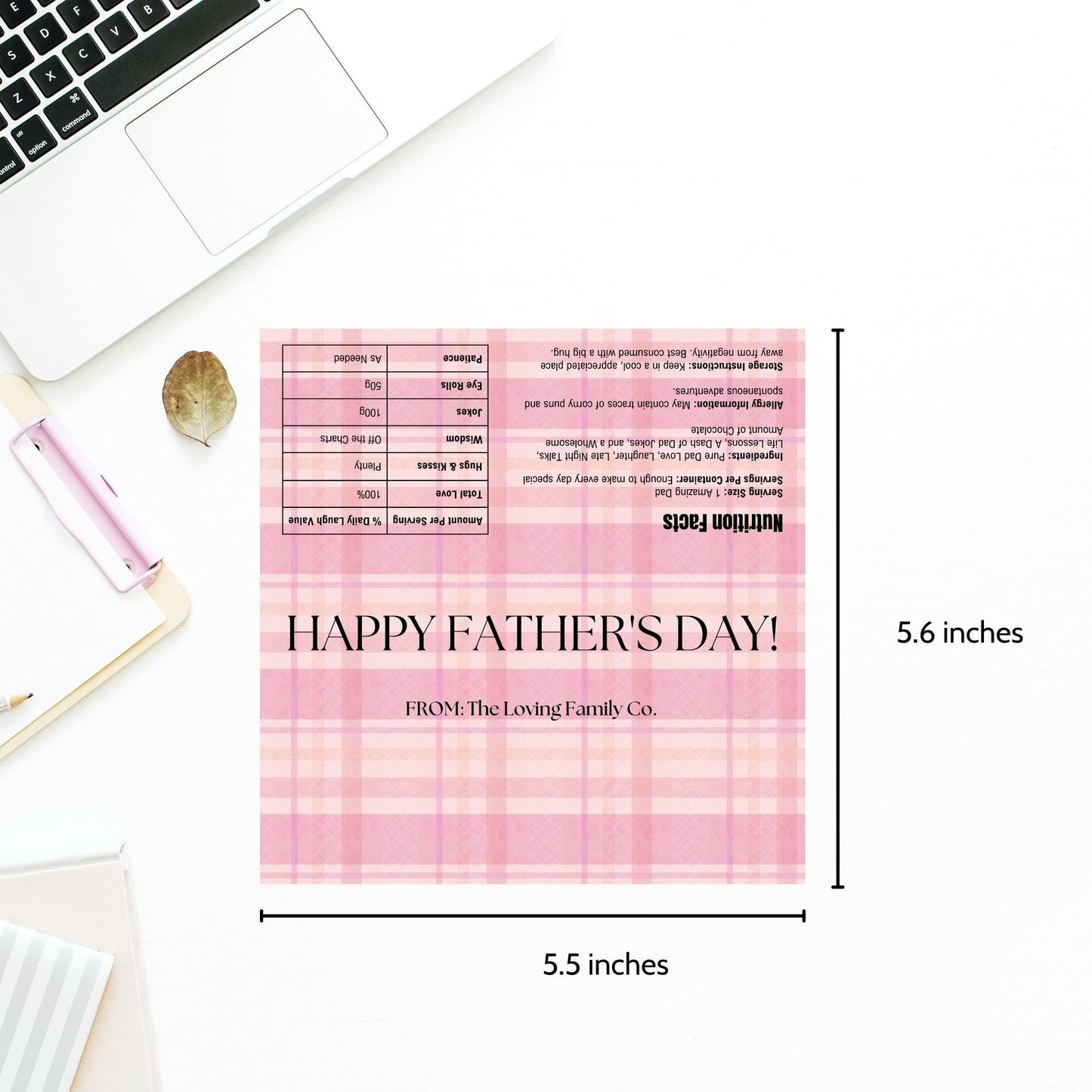 Image of a printable Fathers Day chocolate bar wrapper in a light pink plaid design with HAPPY FATHERS DAY! prominently displayed.