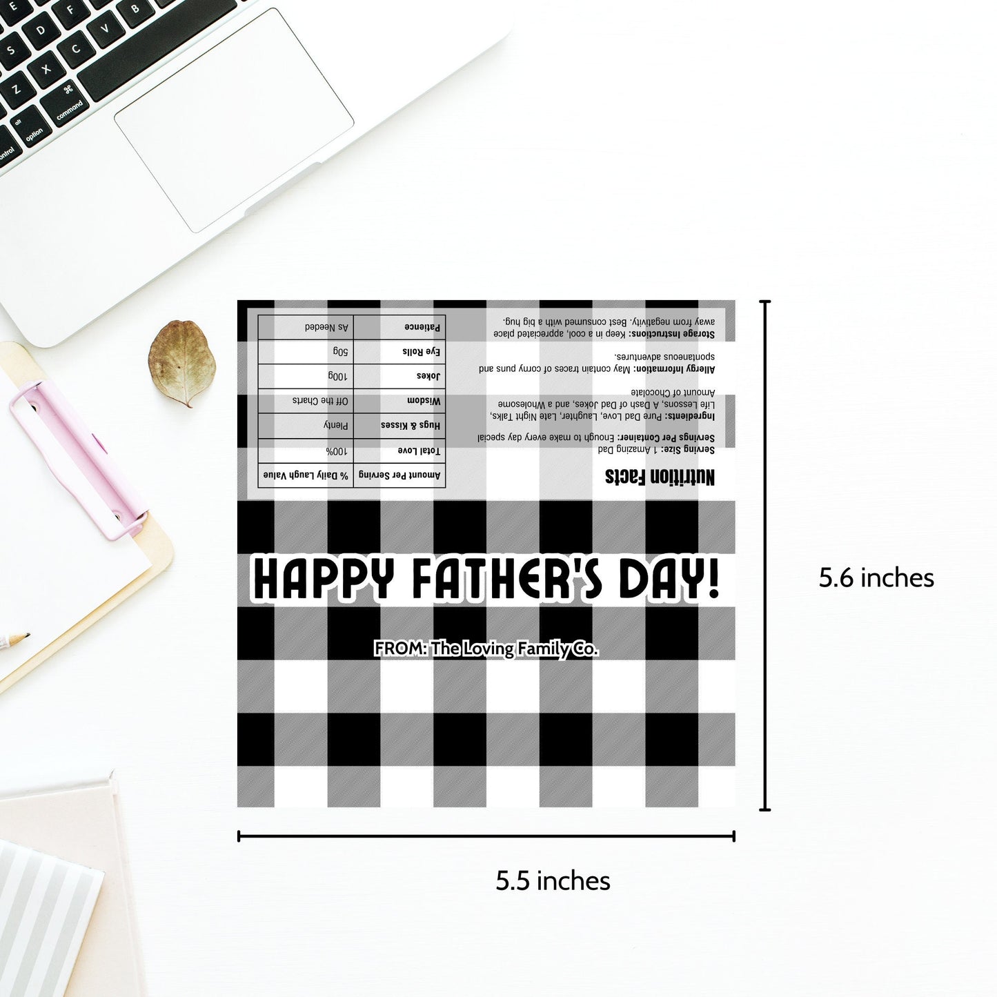 Image of a printable Fathers Day chocolate bar wrapper featuring a sophisticated black and white plaid design with the greeting HAPPY FATHERS DAY! prominently displayed.