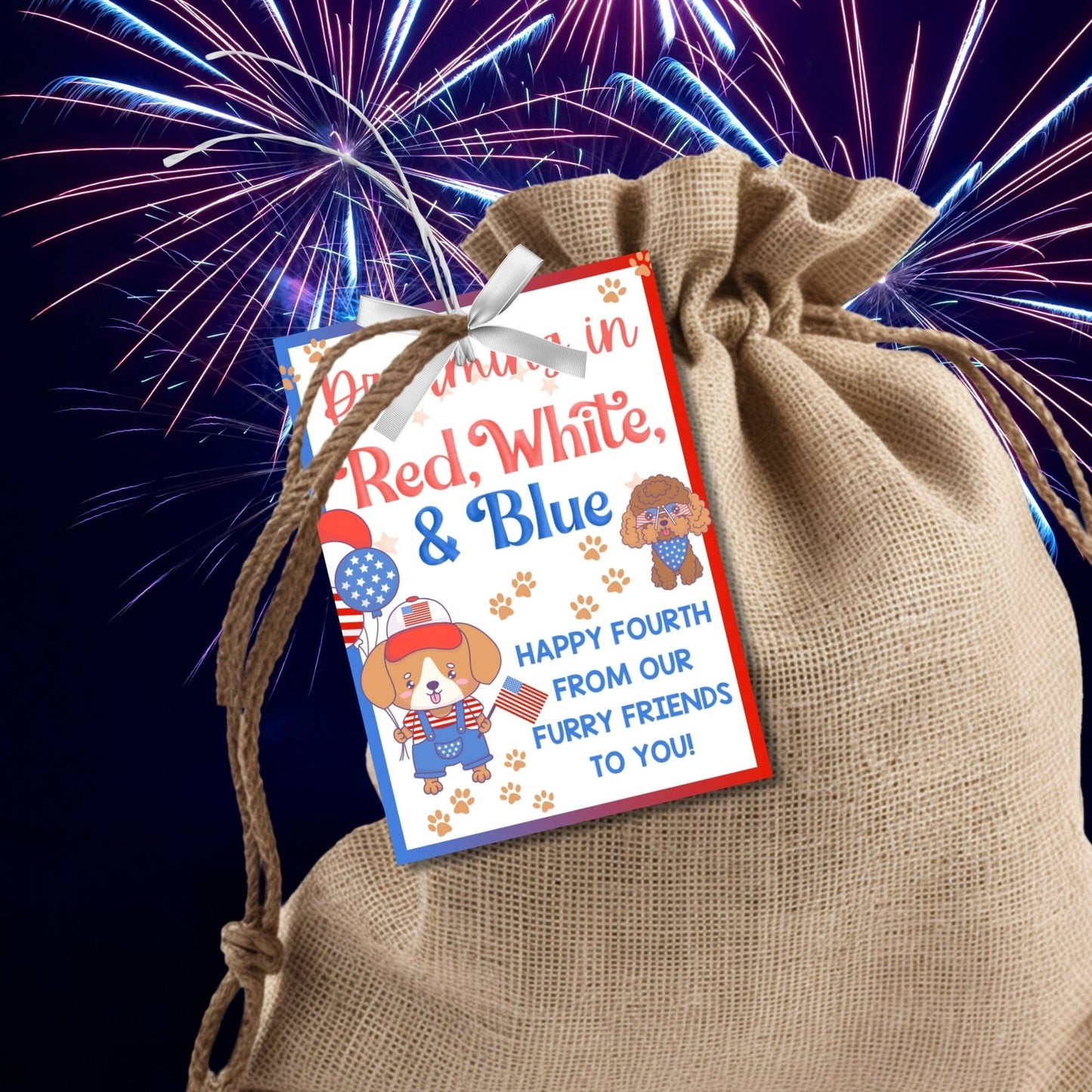 Festive 4th of July printable gift tags featuring patriotic colors, cute dogs, and the message Dreaming in Red, White, & Blue. Happy Fourth from Our Furry Friends to You! Perfect for party favors and gifts.