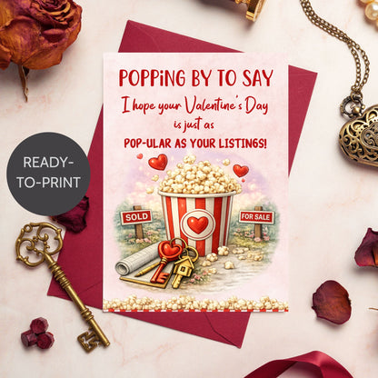 Printable popcorn Valentine’s Day card for realtors featuring a popcorn bucket, real estate signs, keys, and the phrase “Pop-ular as Your Listings,” designed as a client appreciation gift.