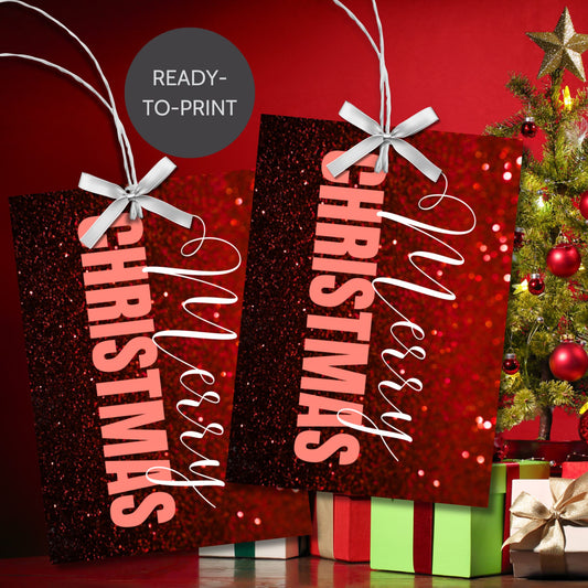 Red-themed ready-to-print Christmas gift tags featuring a glittery red background with elegant "Merry Christmas" text, 2.5 x 3.5 inches, 8 per 8.5 x 11-inch sheet.