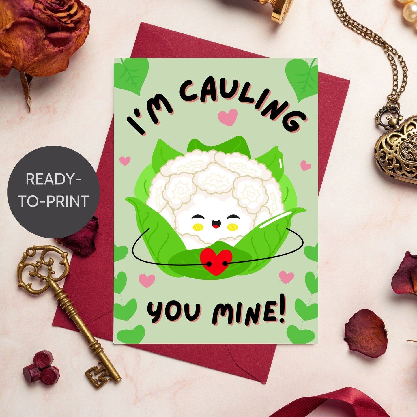 Printable Valentine’s Day Greeting Card featuring the phrase “I’m Cauling You Mine” with a cute cauliflower design. Designed as a 5x7 PDF on an 8.5 x 11 sheet with two cards per page. A fun and punny Valentine’s card for loved ones.