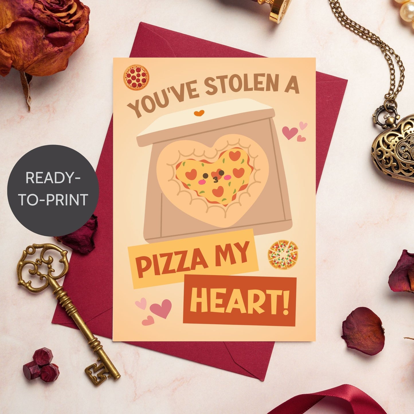 Printable Valentine’s Day Greeting Card featuring the phrase “You’ve Stolen a Pizza My Heart” with a pizza theme. Designed as a 5x7 PDF on an 8.5 x 11 sheet with two cards per page. A fun and punny Valentine’s card for pizza lovers.