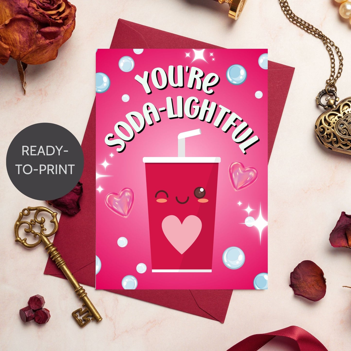 Printable Valentine’s Day Greeting Card featuring the phrase “You’re Soda-lightful” with a soda bottle illustration. Designed as a 5x7 PDF on an 8.5 x 11 sheet with two cards per page. A bubbly and pun-filled Valentine’s card for loved ones.