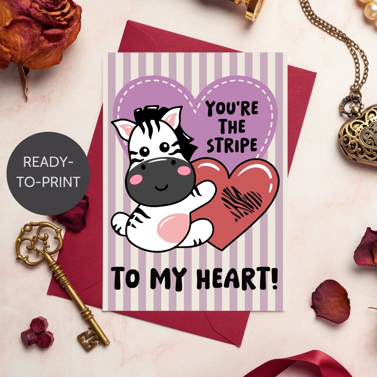 Printable Valentine’s Day Greeting Card featuring the phrase “You’re the Stripe to My Heart” with a zebra design. Designed as a 5x7 PDF on an 8.5 x 11 sheet with two cards per page. A cute and heartfelt Valentine’s card for zebra lovers.