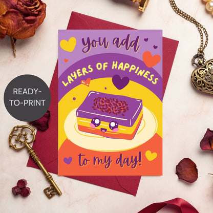 Printable Valentine’s Day card featuring the phrase “You Add Layers of Happiness to My Day” with a Filipino Sapin-Sapin-inspired design. Designed as a 5x7 PDF on an 8.5 x 11 sheet with two cards per page. A punny and heartfelt Valentine’s card for Filipino food lovers.