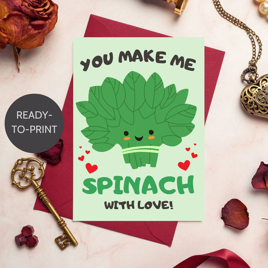 Printable Valentine’s Day Greeting Card featuring the phrase “You Make Me Spinach with Love” with a fun spinach design. Designed as a 5x7 PDF on an 8.5 x 11 sheet with two cards per page. A punny and fresh Valentine’s card for loved ones.