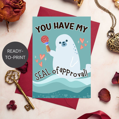 Printable Valentine’s Day Greeting Card featuring the phrase “You Have My Seal of Approval” with a seal theme. Designed as a 5x7 PDF on an 8.5 x 11 sheet with two cards per page. A cute and playful Valentine’s card for animal lovers.