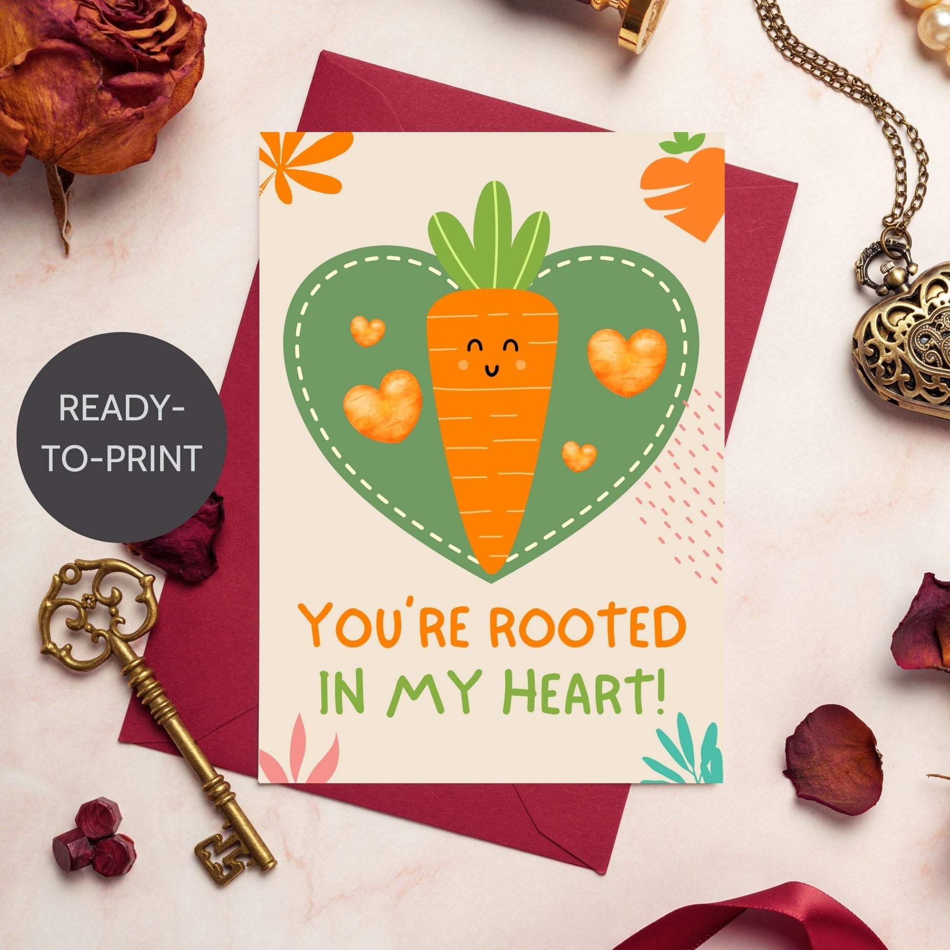 Printable Valentine’s Day Greeting Card featuring the phrase “You’re Rooted in My Heart” with a carrot theme. Designed as a 5x7 PDF on an 8.5 x 11 sheet with two cards per page. A sweet and punny Valentine’s card for veggie lovers and friends.