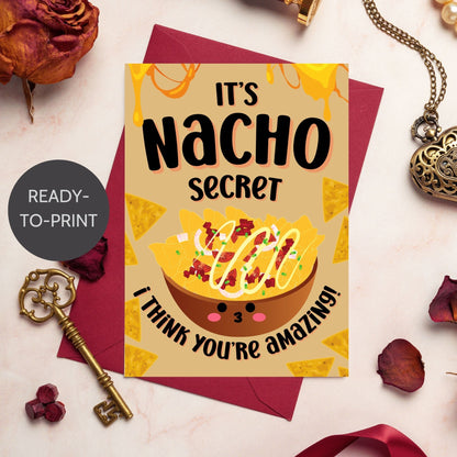 Printable Valentine’s Day card featuring the phrase “It’s Nacho Secret I Think You’re Amazing” with a fun nacho design. Designed as a 5x7 PDF on an 8.5 x 11 sheet with two cards per page. A punny and spicy Valentine’s card for loved ones.