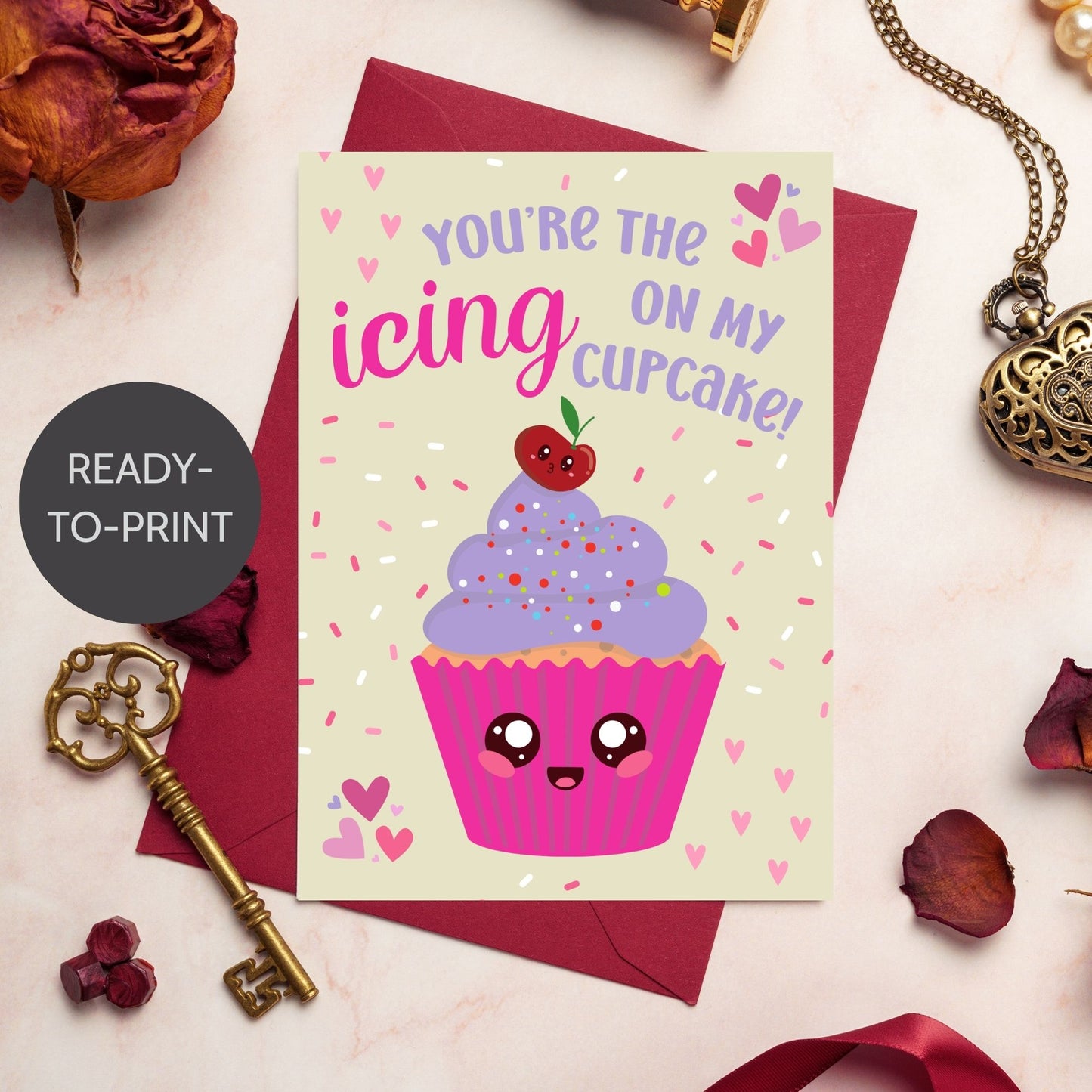 Printable Valentine’s Day card featuring the phrase “You’re the Icing on My Cupcake” with a cute cupcake design. Designed as a 5x7 PDF on an 8.5 x 11 sheet with two cards per page. A punny and sweet Valentine’s card for loved ones.