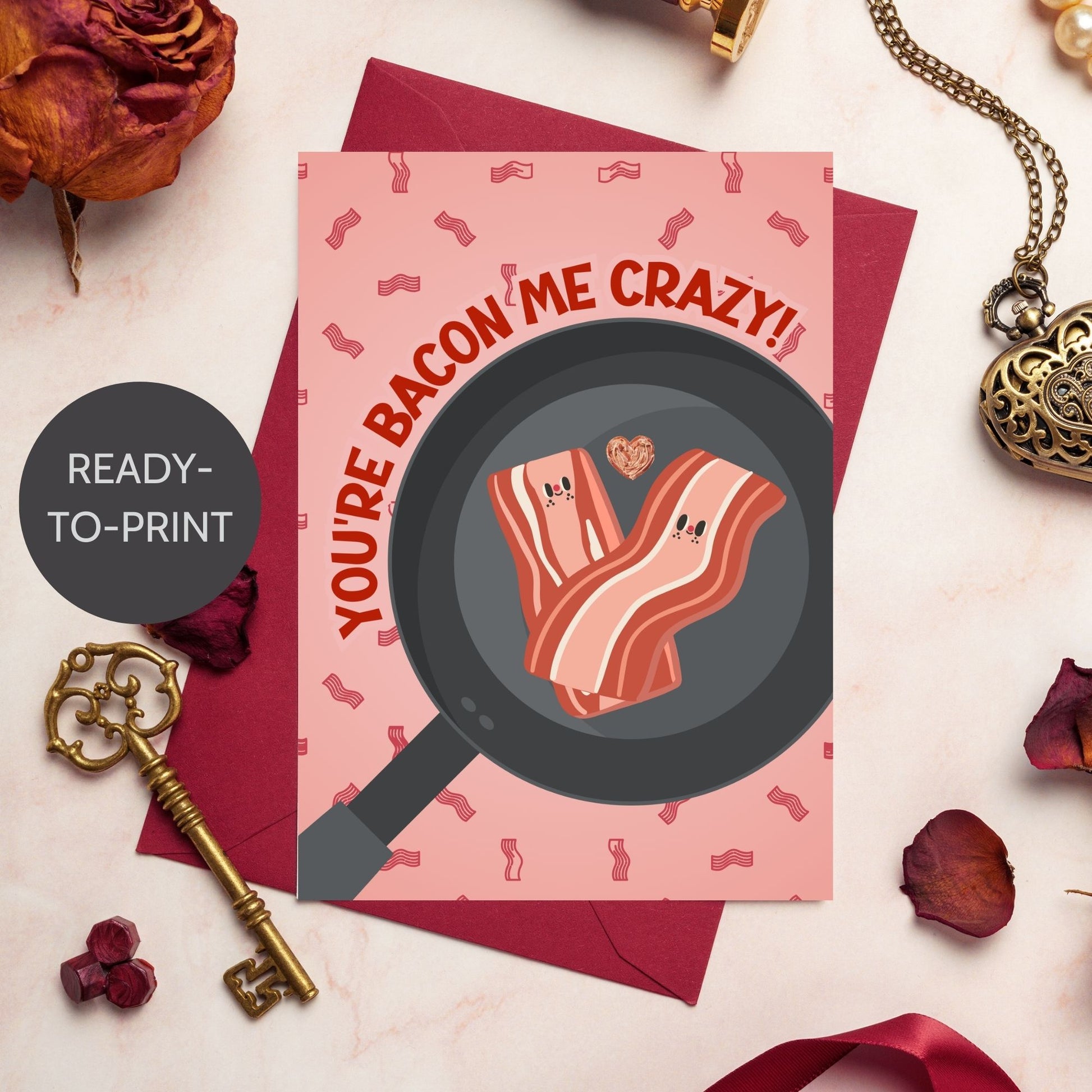 Printable Valentine’s Day Greeting Card featuring the phrase “You’re Bacon Me Crazy” with a bacon theme. Designed as a 5x7 PDF on an 8.5 x 11 sheet with two cards per page. A fun and punny Valentine’s card for bacon lovers and friends.