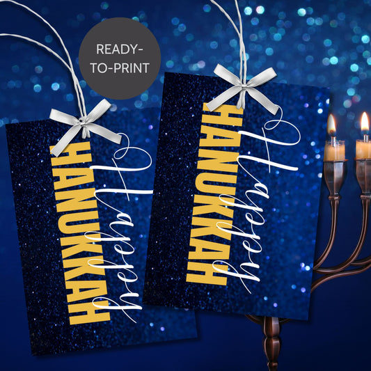 A set of Happy Hanukkah gift tags featuring "Happy Hanukkah" in white and gold text on a glittering blue background. Perfect for festive gift wrapping during the Festival of Lights.