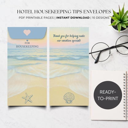 A styled flat-lay showing two beach-themed housekeeping envelope designs with printed text and illustrations, plus a notebook labeled 'READY-TO-PRINT' and a small potted plant on a light marble surface. Text at the top reads 'HOTEL HOUSEKEEPING TIPS ENVELOPES' and 'PDF PRINTABLE PAGES | INSTANT DOWNLOAD | 10 DESIGNS'.