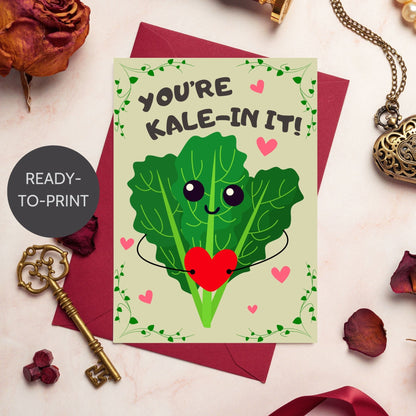 Printable Valentine’s Day Greeting Card featuring the phrase “You’re Kalein’ It” with a cute kale illustration. Designed as a 5x7 PDF on an 8.5 x 11 sheet with two cards per page. A punny and fresh Valentine’s card for loved ones.