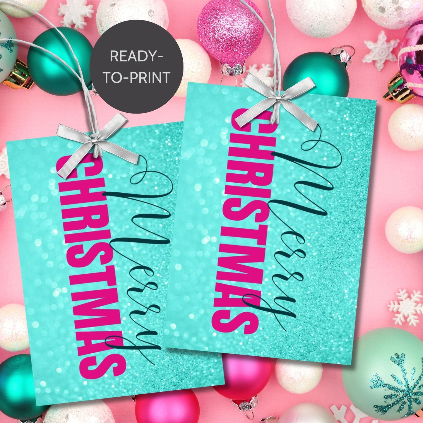 Printable Christmas gift tags featuring an aqua glitter background with bold magenta "Merry Christmas" text and black script accents, sized 2.5 x 3.5 inches, 8 tags per sheet.