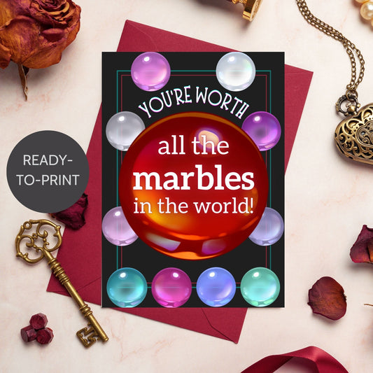 A Squid Game-inspired printable Valentine's Day card featuring a marbles theme. The card has a bold, fun design with the phrase "You're Worth All the Marbles in the World," making it a perfect gift for fans of the show, gamers, and pop culture enthusiasts.