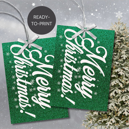 A set of green and white Christmas gift tags featuring "Merry Christmas!" in elegant white script on a glittering green background adorned with snowflake accents. Perfect for festive gift wrapping.