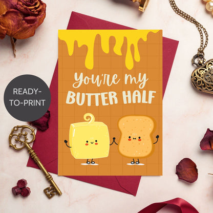 Printable Valentine’s Day Greeting Card featuring the phrase “You’re My Butter Half” with a cute butter illustration. Designed as a 5x7 PDF on an 8.5 x 11 sheet with two cards per page. A punny and sweet Valentine’s card for loved ones.