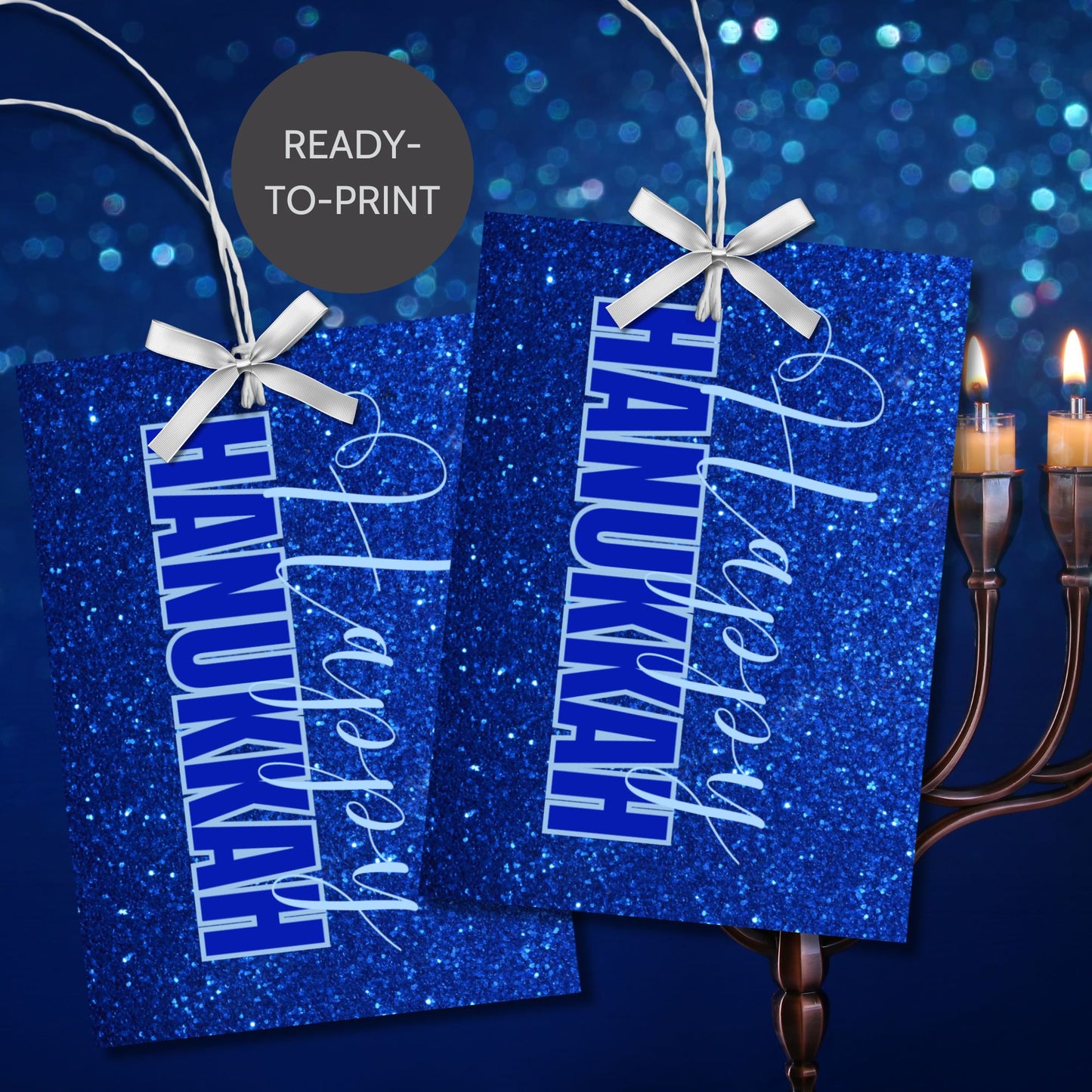 A set of printable Hanukkah gift tags featuring "Happy Hanukkah" in white and blue text on a sparkling blue glitter background. Perfect for Hanukkah gift wrapping.