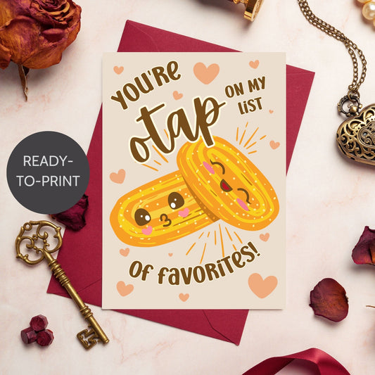 Printable Valentine’s Day card featuring the phrase “You’re Otap on My List of Favorites” with a fun Otap biscuit design. Designed as a 5x7 PDF on an 8.5 x 11 sheet with two cards per page. A punny and heartfelt Valentine’s card for Filipino food lovers.