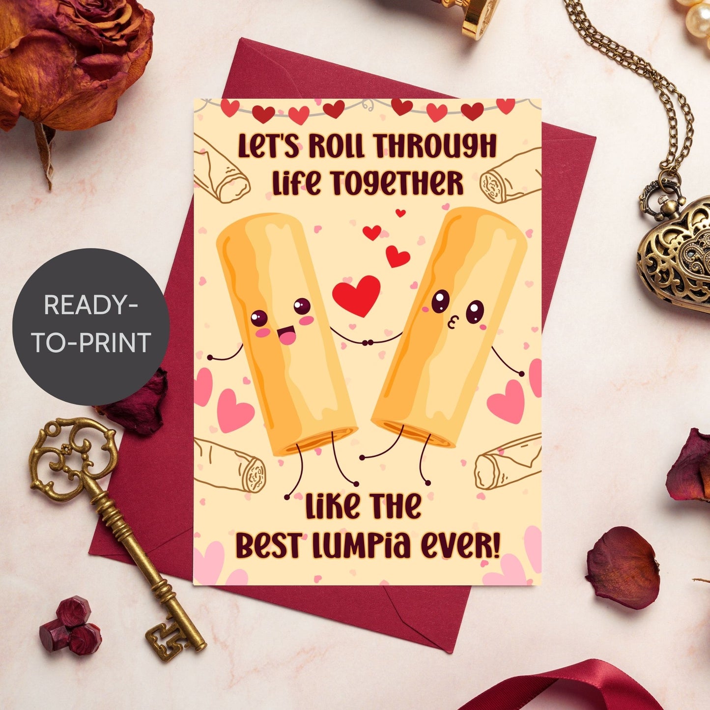 Printable Valentine’s Day card featuring the phrase “Let’s Roll Through Life Together Like the Best Lumpia Ever” with a Filipino Lumpia-inspired design. Designed as a 5x7 PDF on an 8.5 x 11 sheet with two cards per page. A punny and heartfelt Valentine’s card for Filipino food lovers.