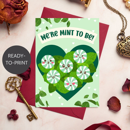 Printable Valentine’s Day card featuring the phrase “We’re Mint to Be” with a fun and fresh mint design. Designed as a 5x7 PDF on an 8.5 x 11 sheet with two cards per page. A punny and refreshing Valentine’s card for loved ones.