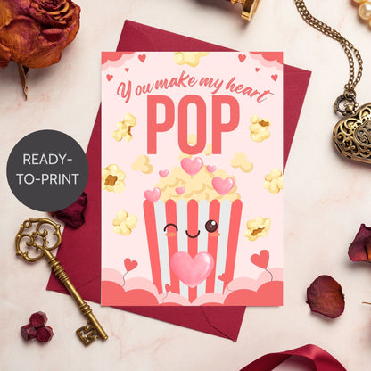 Printable Valentine’s Day Greeting Card featuring the phrase “You Make My Heart Pop” with a popcorn theme. Designed as a 5x7 PDF on an 8.5 x 11 sheet with two cards per page. A fun and whimsical Valentine’s card for movie and snack lovers.