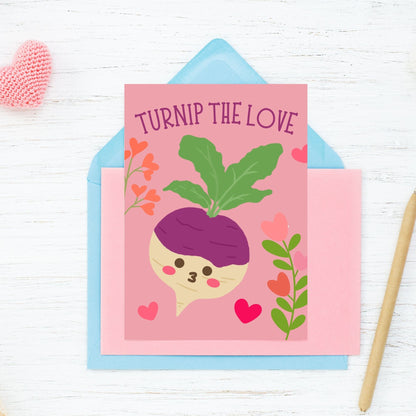 Printable Valentine’s Day Greeting Card featuring the phrase “Turnip the Love” with a cute turnip illustration. Designed as a 5x7 PDF on an 8.5 x 11 sheet with two cards per page. A punny and playful Valentine’s card for loved ones.