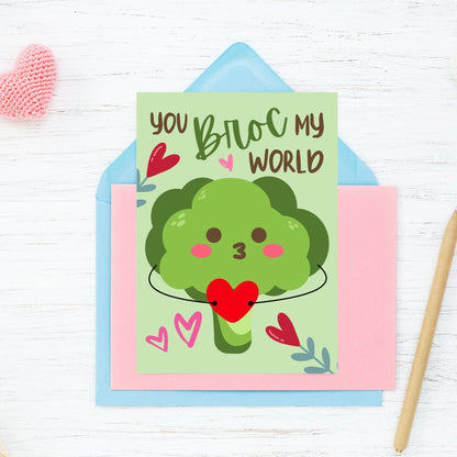 Printable Valentine’s Day Greeting Card featuring the phrase “You Broc My World” with a fun broccoli design. Designed as a 5x7 PDF on an 8.5 x 11 sheet with two cards per page. A punny and veggie-themed Valentine’s card for loved ones.