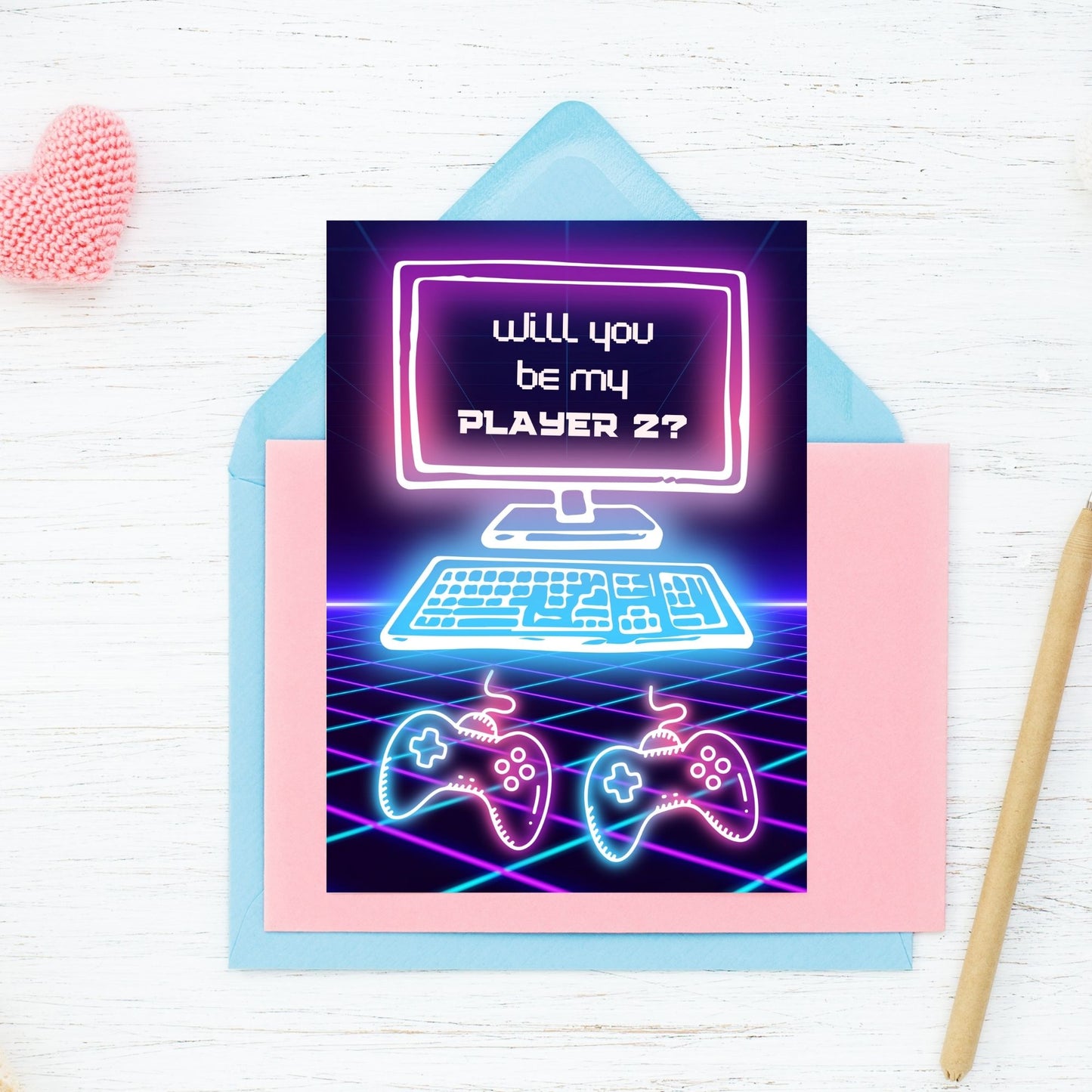 Printable Valentine’s Day Greeting Card with the message “Will You Be My Player 2?” Designed as a 5x7 PDF on an 8.5 x 11 sheet with two cards per page. A fun and geeky Valentine’s card for gamers and couples.