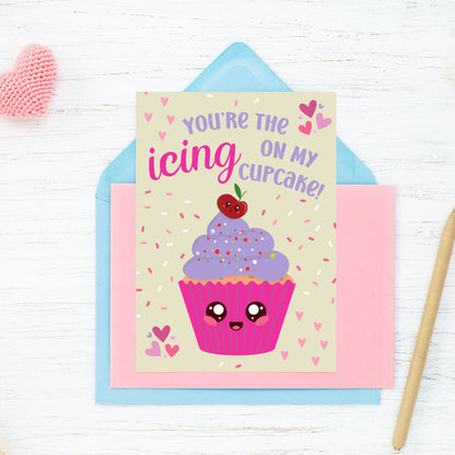 Printable Valentine’s Day card featuring the phrase “You’re the Icing on My Cupcake” with a cute cupcake design. Designed as a 5x7 PDF on an 8.5 x 11 sheet with two cards per page. A punny and sweet Valentine’s card for loved ones.