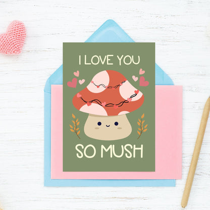 Printable Valentine’s Day Greeting Card featuring the pun “I Love You So Mush.” Designed as a 5x7 PDF on an 8.5 x 11 sheet with two cards per page. A cute and punny Valentine’s card for mushroom lovers.