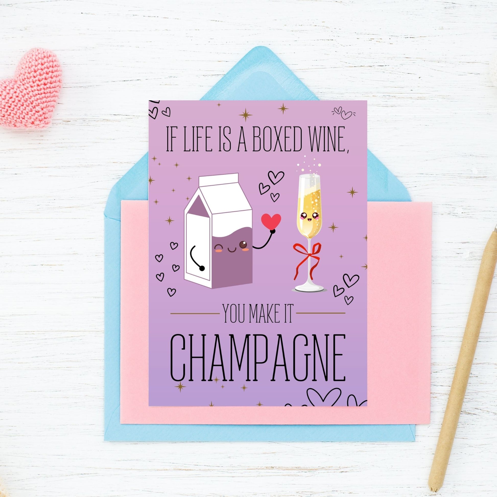 Printable Valentine’s Day card featuring the phrase “If Life Is a Boxed Wine, You Make It Champagne” with an elegant design. Designed as a 5x7 PDF on an 8.5 x 11 sheet with two cards per page. A chic and witty Valentine’s card for loved ones.