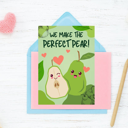 A cute and punny printable Valentine’s Day card featuring two adorable pears with smiling faces, symbolizing the perfect pair in love or friendship.