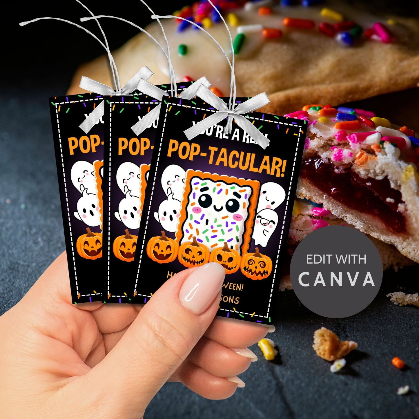 Halloween gift tag featuring a cute Pop-Tart with sprinkles, surrounded by pumpkins and ghosts, with the message 'You're a Real Pop-tacular!'