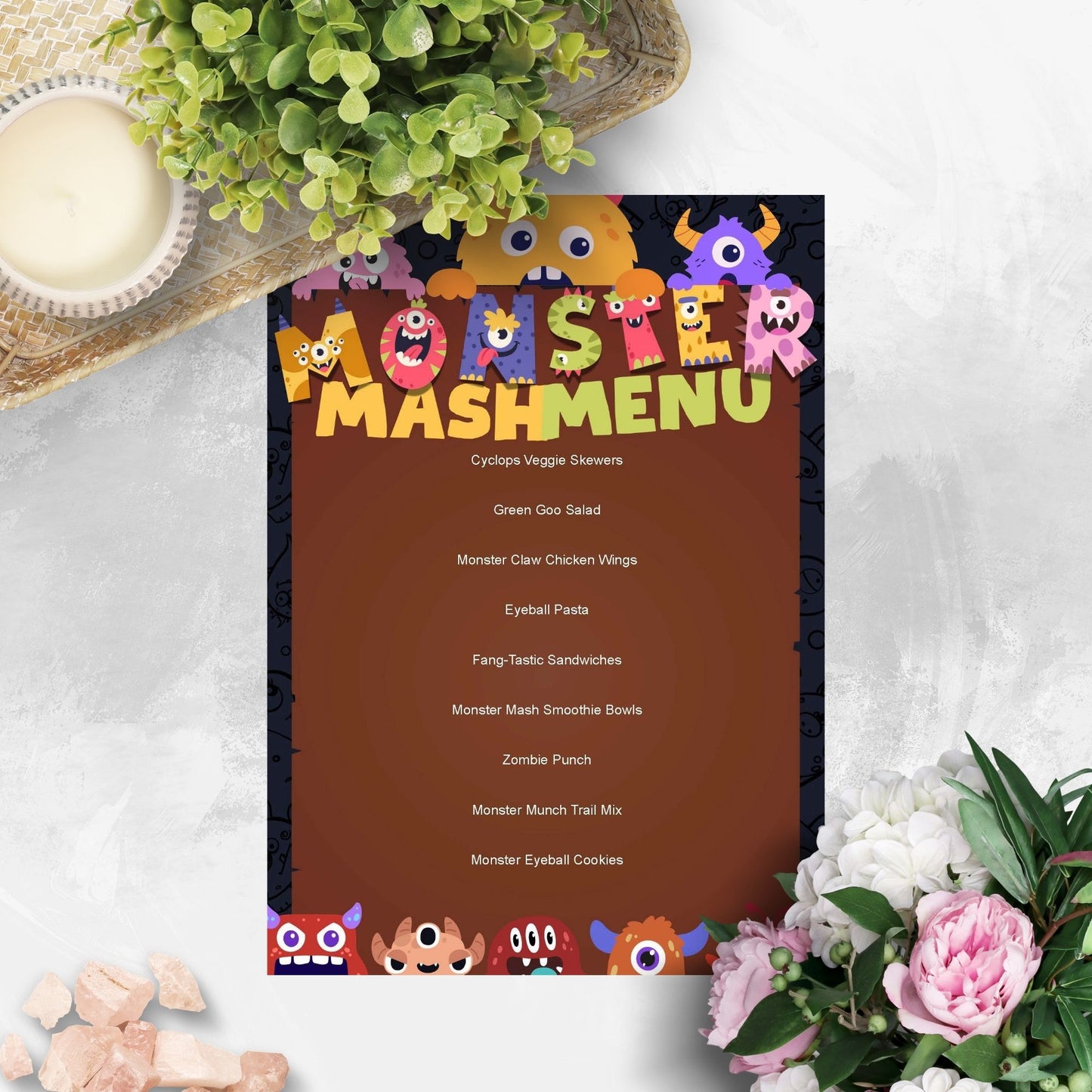 Editable Monster Mash Menu featuring fun, monster-themed food items like Cyclops Veggie Skewers, Monster Claw Chicken Wings, and Zombie Punch, perfect for Halloween and monster-themed parties.