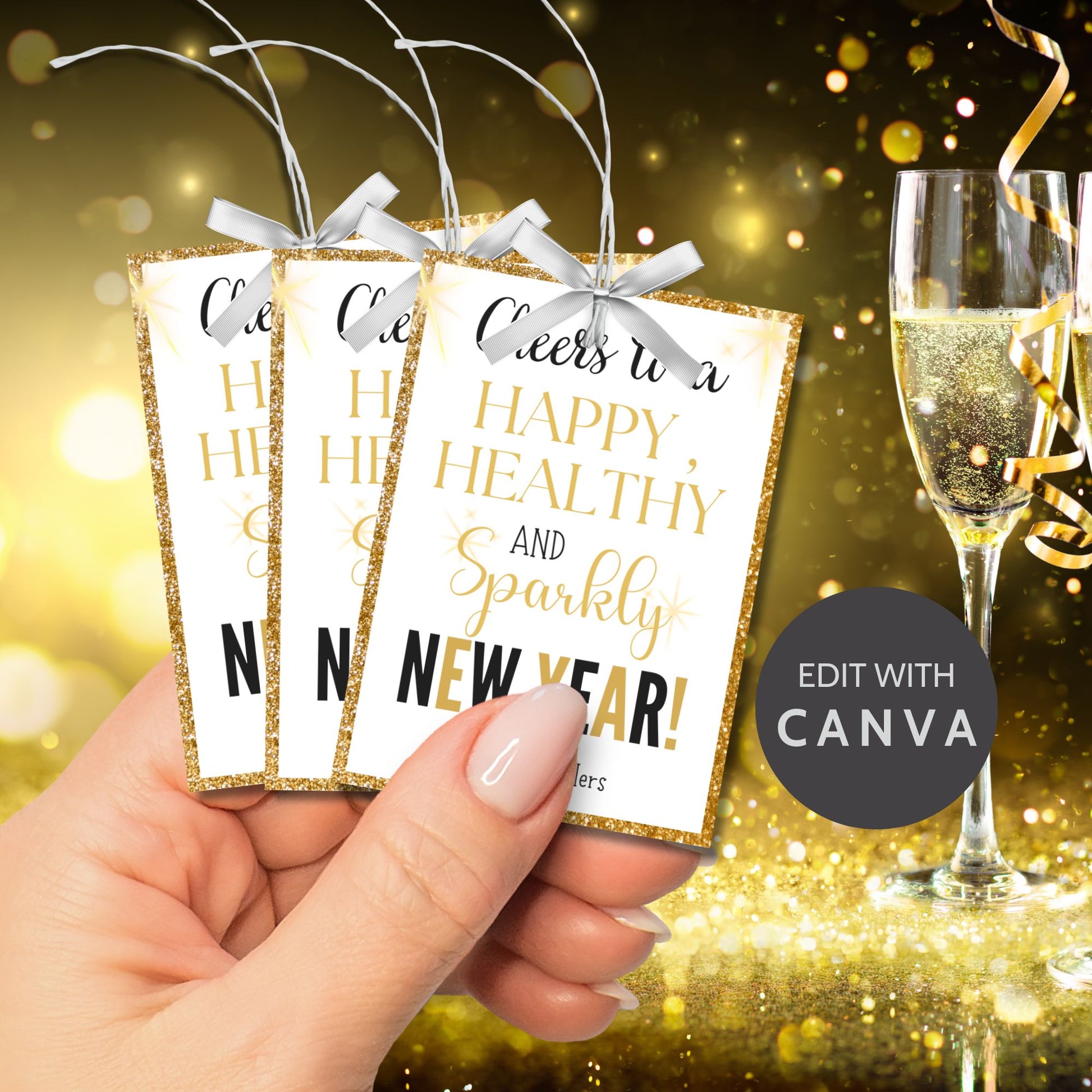 Gold and glittery editable printable New Year gift tags reading “Cheers to a Happy, Healthy, and Sparkly New Year!” laid out on an 8.5 x 11 sheet with 8 tags.