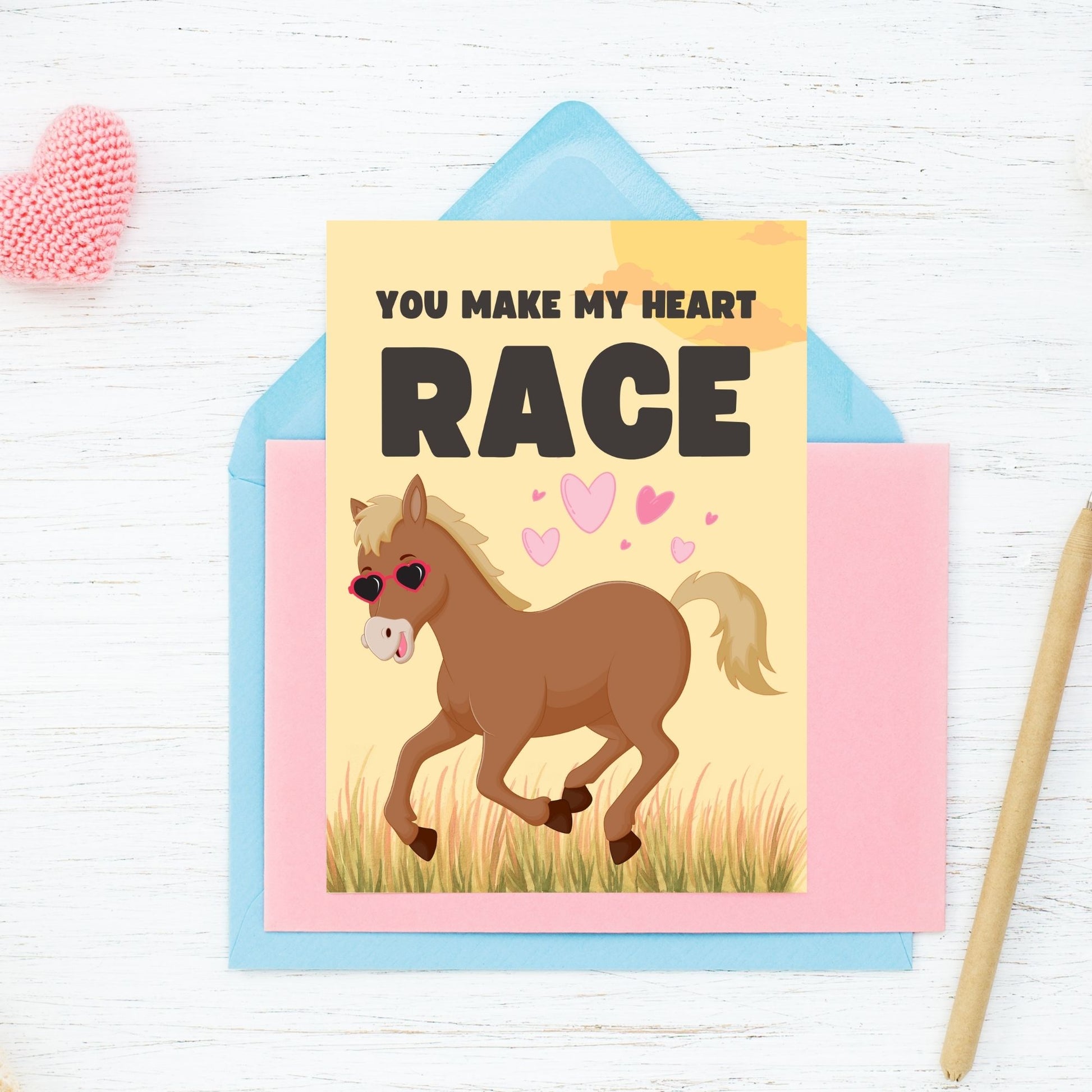 Printable Valentine’s Day Greeting Card featuring the phrase “You Make My Heart Race” with a horse design. Designed as a 5x7 PDF on an 8.5 x 11 sheet with two cards per page. A heartfelt and elegant Valentine’s card for horse lovers and friends.