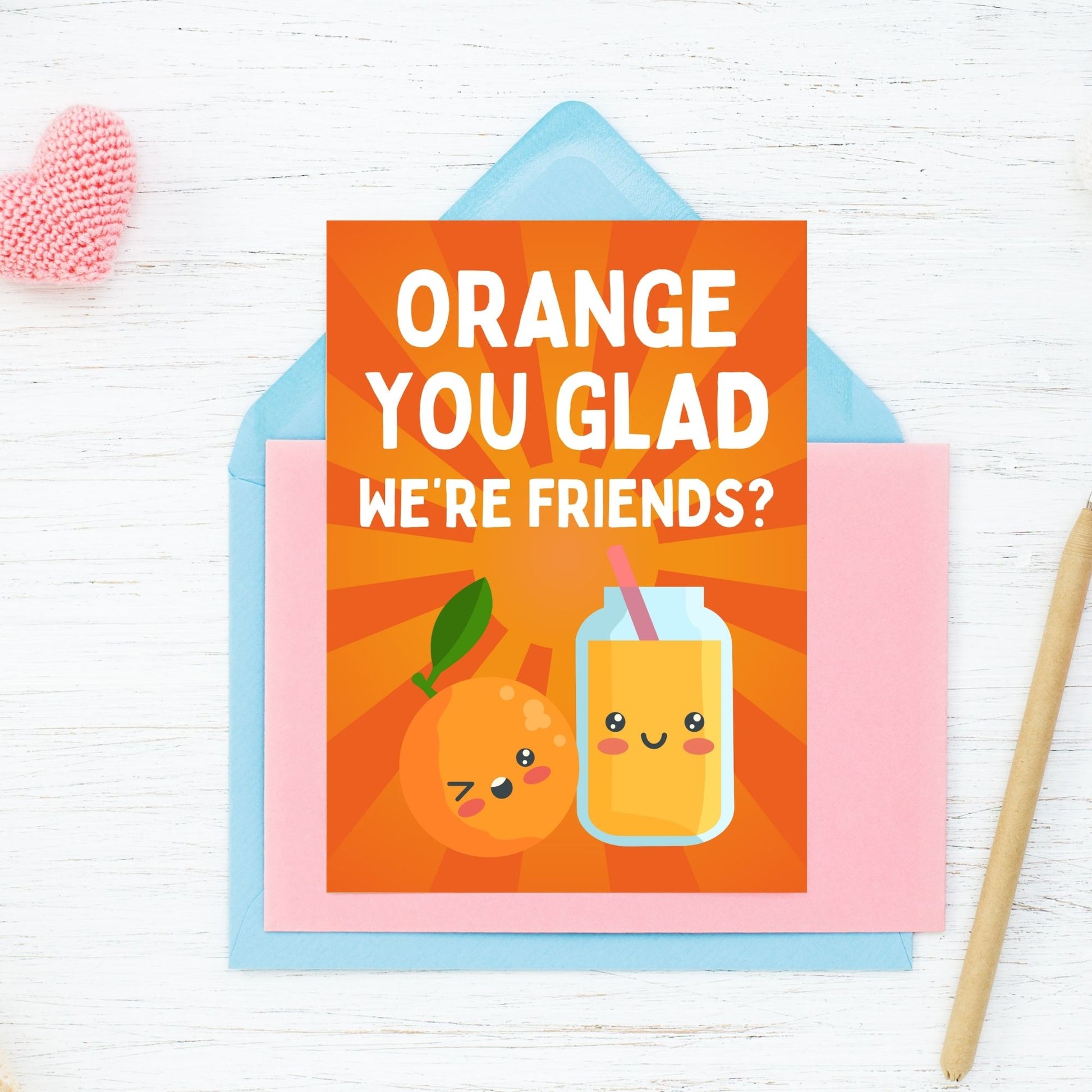 Printable Valentine’s Day Greeting Card featuring the phrase “Orange You Glad We’re Friends” with a cheerful orange theme. Designed as a 5x7 PDF on an 8.5 x 11 sheet with two cards per page. A fun and sweet Valentine’s card for friends.