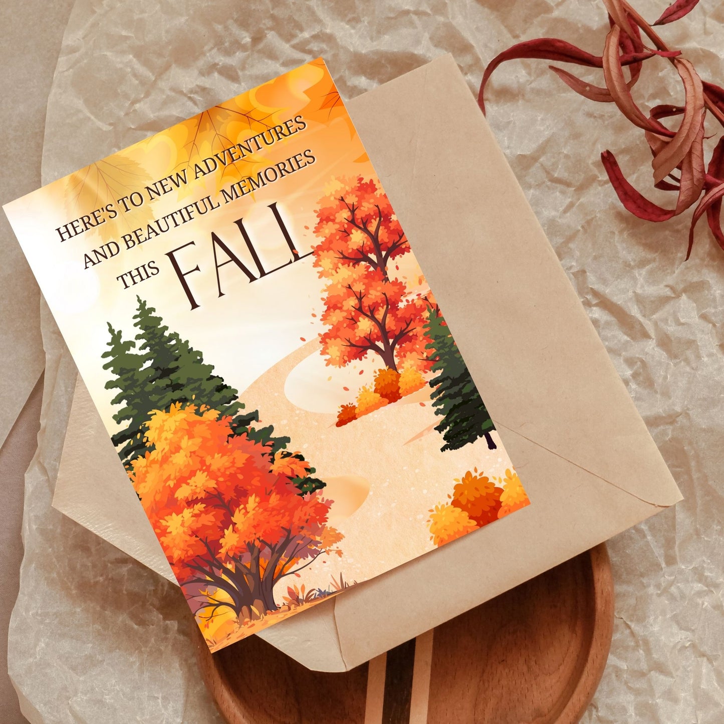 Printable Fall Greeting Card with a serene autumn path and colorful trees, featuring the message 'Here's to New Adventures and Beautiful Memories This Fall,' ideal for seasonal greetings.