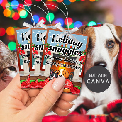 Christmas gift tags featuring a cozy dog and cat cuddled under a festive blanket by a snowy window, with the message "Holiday Snuggles from Your Best Friend." These printable and editable tags add warmth and charm to holiday gifts.