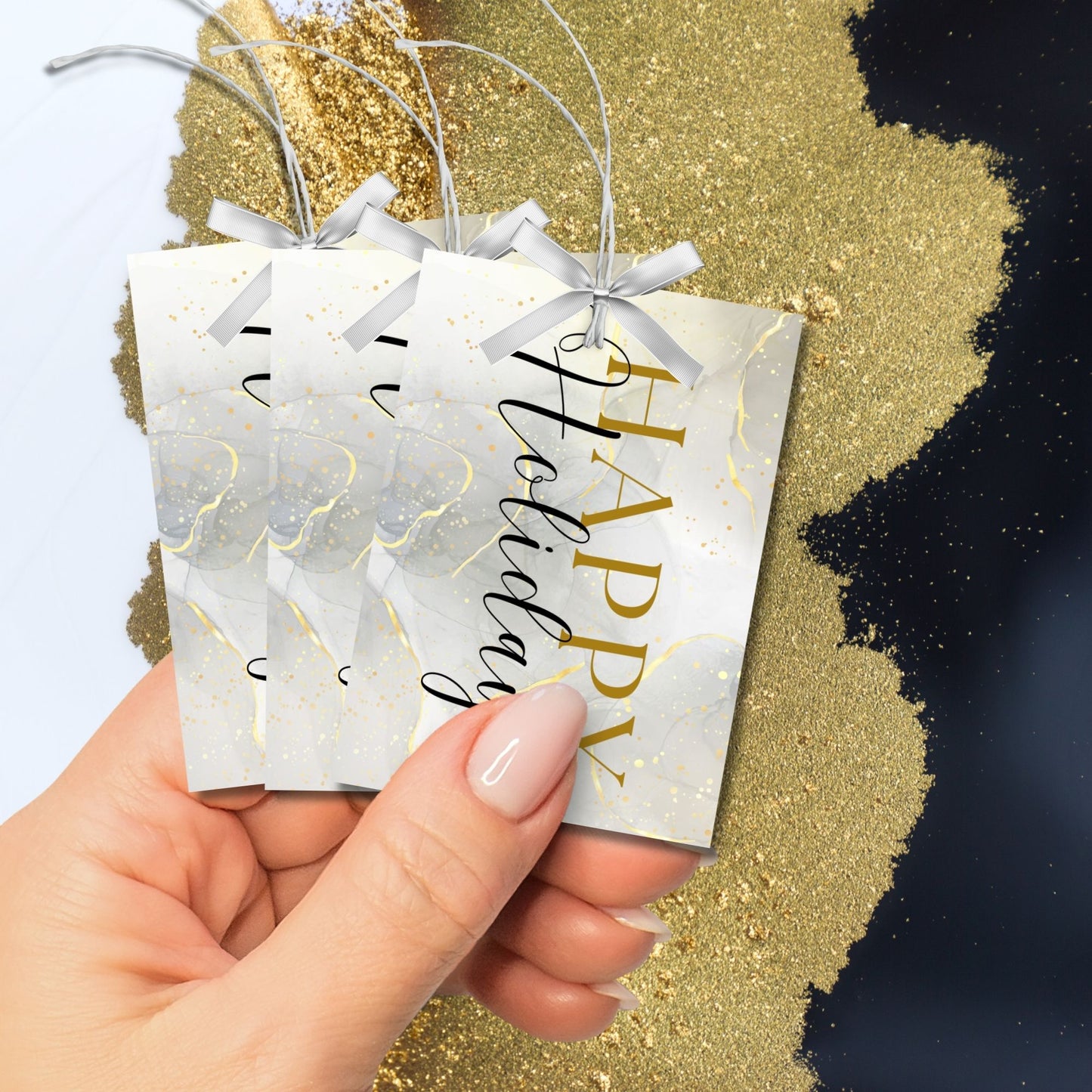 Luxury Holiday gift tags featuring a marble background with gold accents and black "Happy Holidays" typography, sized 2.5 x 3.5 inches, 8 tags per sheet.