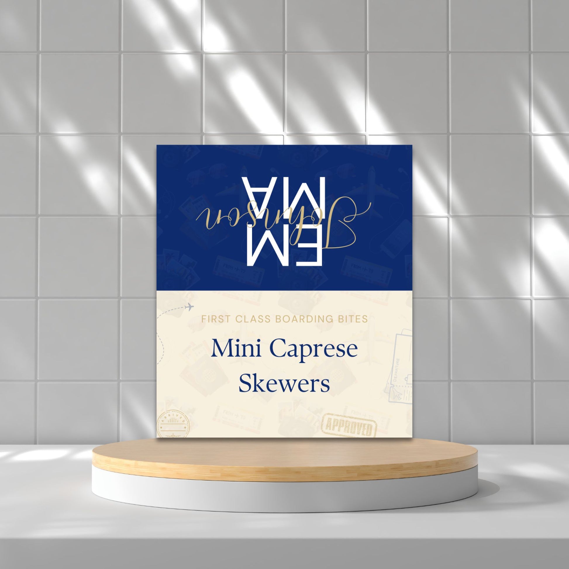 Folded editable graduation place card with navy and gold travel-themed "Passport to the Future" design, reading “Mini Caprese Skewers”