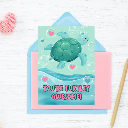 Printable Valentine’s Day Greeting Card featuring the pun “You're Turtley Awesome.” Designed as a 5x7 PDF on an 8.5 x 11 sheet with two cards per page. A cute and fun Valentine’s card for turtle lovers and friends.