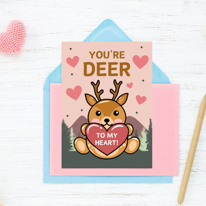 Printable Valentine’s Day Greeting Card featuring the phrase “You’re Deer to My Heart” with a deer illustration. Designed as a 5x7 PDF on an 8.5 x 11 sheet with two cards per page. A heartfelt and punny Valentine’s card for loved ones.