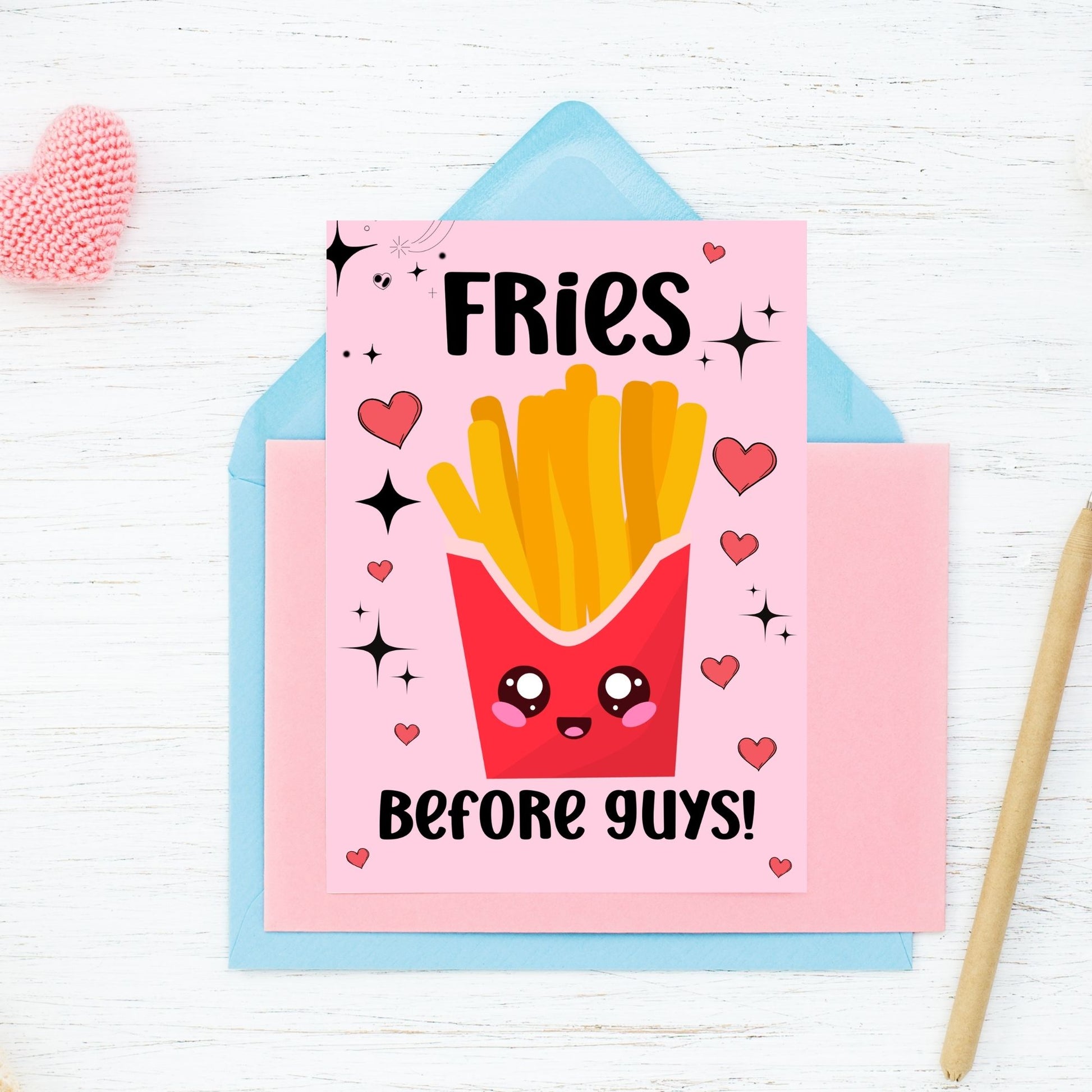 A stylish printable Galentine’s Day greeting card with a fun "Fries Before Guys" message, perfect for best friends, featuring a 5x7-inch design for instant download and printing.