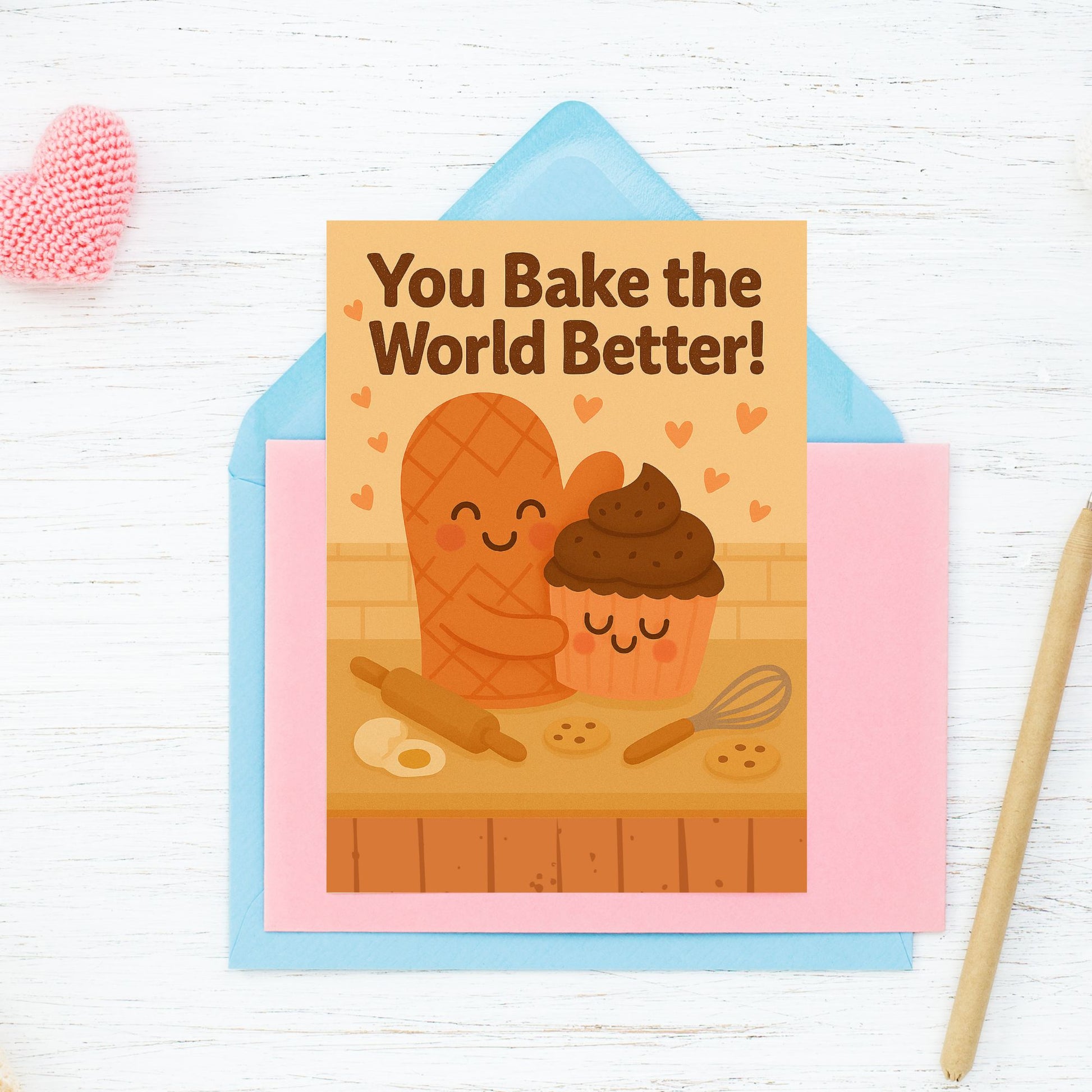 Printable 5x7 Mother's Day greeting card with a cute baking pun – "You Bake the World Better" featuring pastel illustrations and sweet treats, available as an instant download.